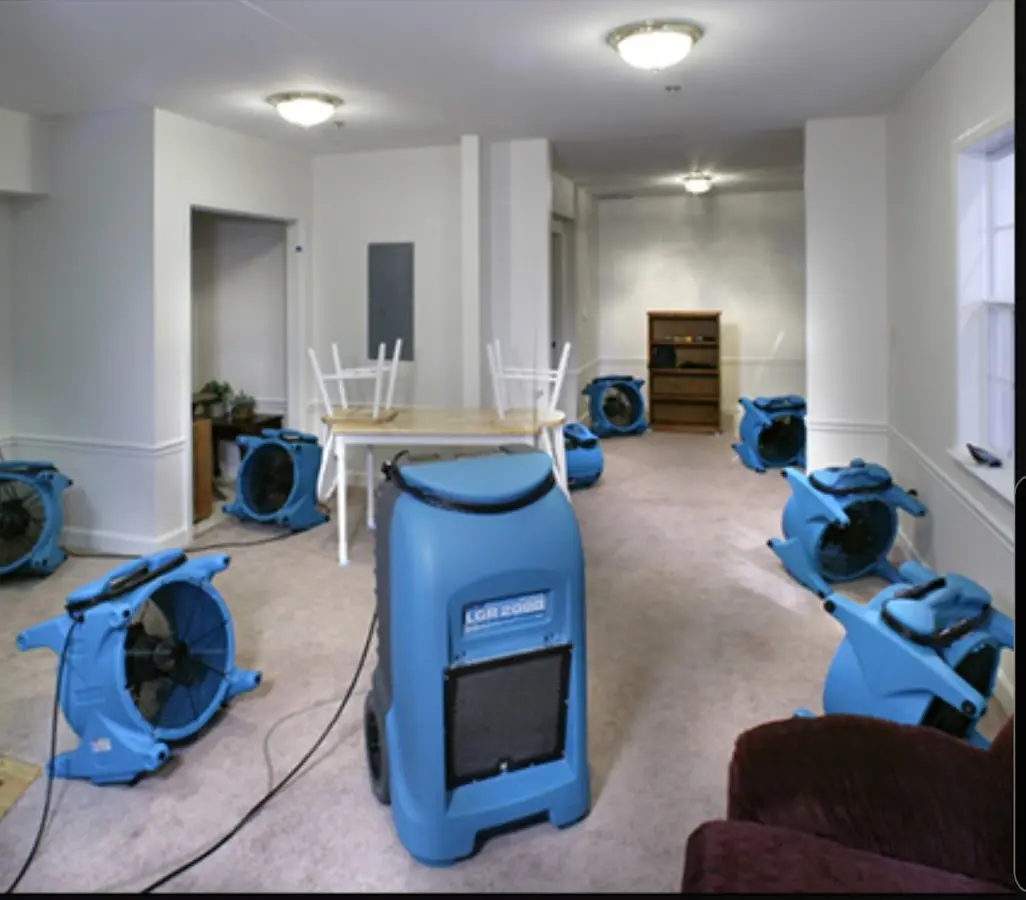 Air movers and dehumidifier setup for Water Damage Restoration in River Road